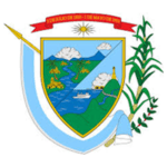 Emblema que presenta un escudo con una escena de río, un barco, sol y nubes, flanqueado por plantas verdes, rematado con una pancarta roja que dice "1838-el paso-1888" y "texas" en la parte inferior.