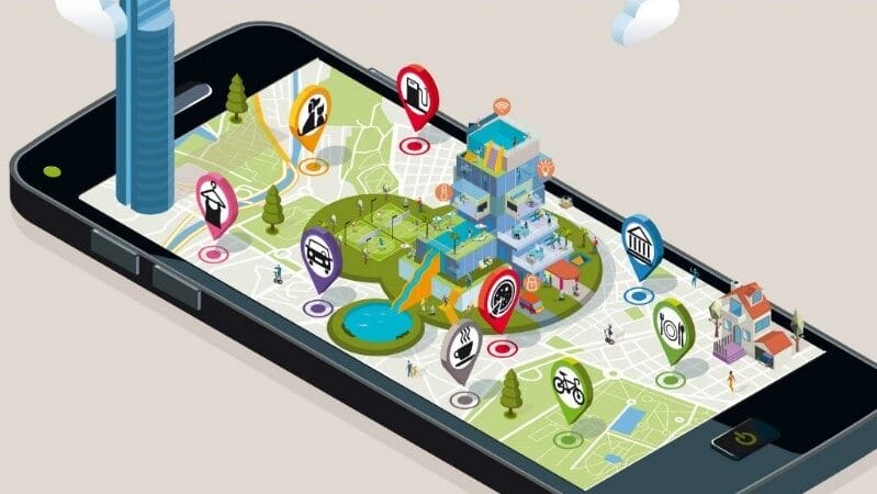 Ilustración de un teléfono inteligente que muestra un mapa de la ciudad en 3D con varios íconos y puntos de referencia que indican ubicaciones como parques, hospitales y escuelas.